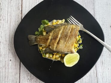 Pan fried bluegill over creamy corn.